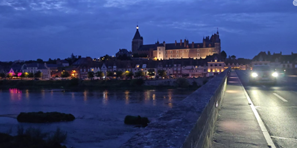 Image of bridge and Gien town at night